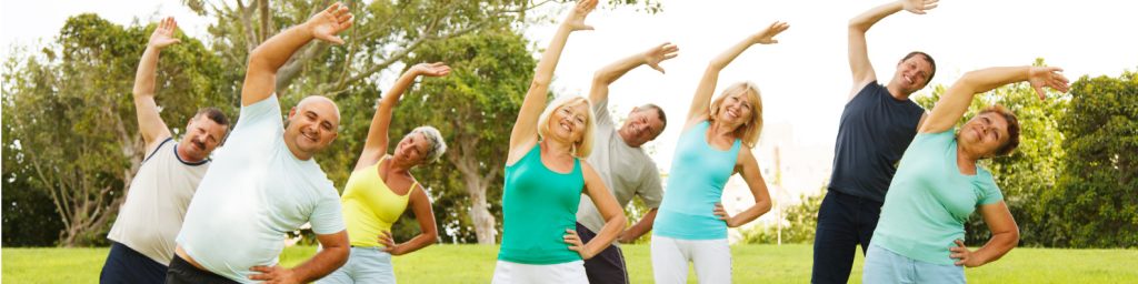Older men & women exercise all together for their healthy lifestyle